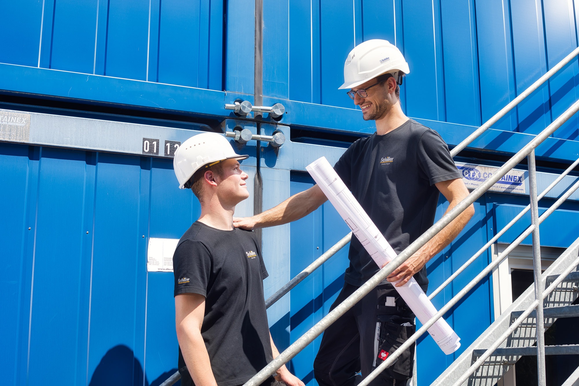 Bauleiter mit Mitarbeiter